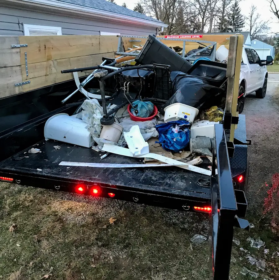 Roll-off dumpster delivered to a residential driveway in Byron